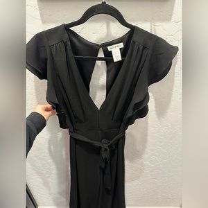 Beautiful black Jumpsuit with Low back detail! Gently used